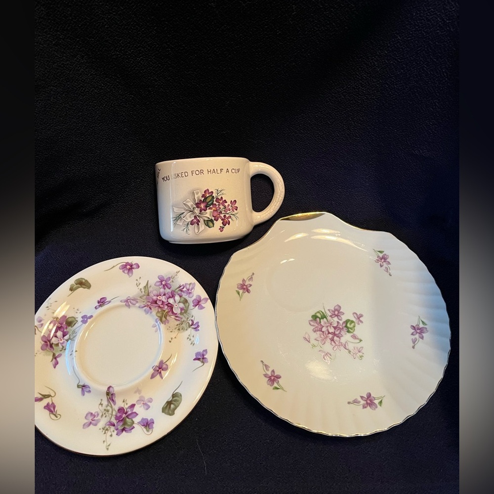 3 floral items.  A bone china under plate for an inkwell. A wall vase and snack